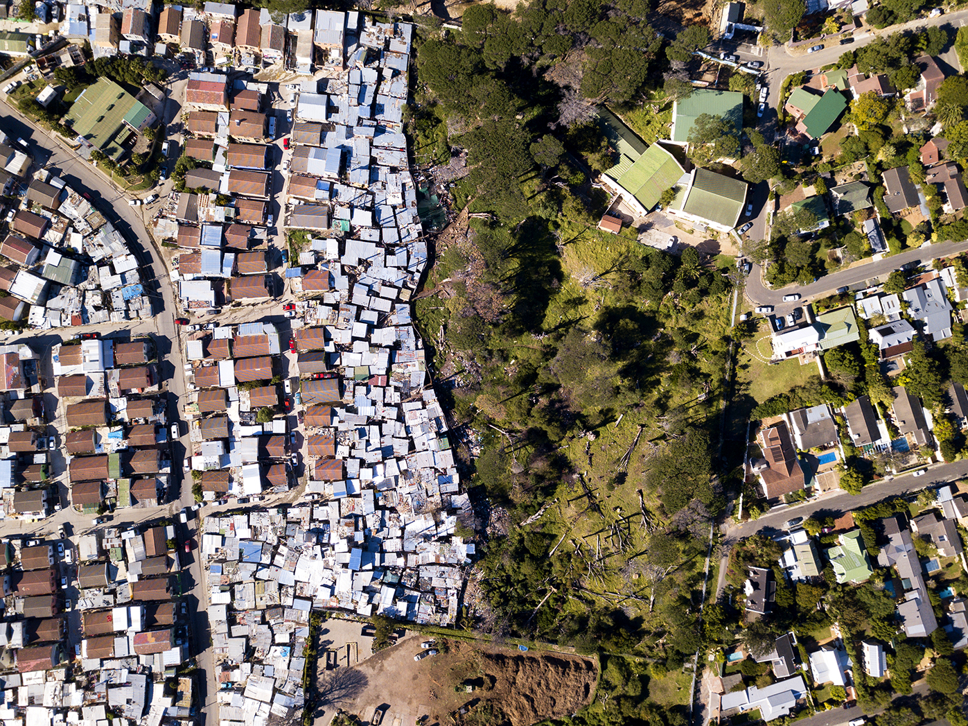 Aerial picture showing large houses next to township in Cape Town South Africa